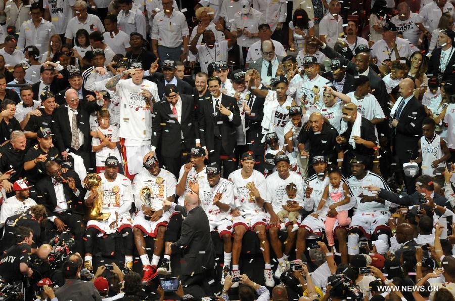 Members of Miami Heat celebrate after the game 7 of the NBA finals against San Antonio Spurs in Miami, the United States, on June 20, 2013. Heat defeated Spurs 95-88 and won the champion. (Xinhua/Wang Lei) 