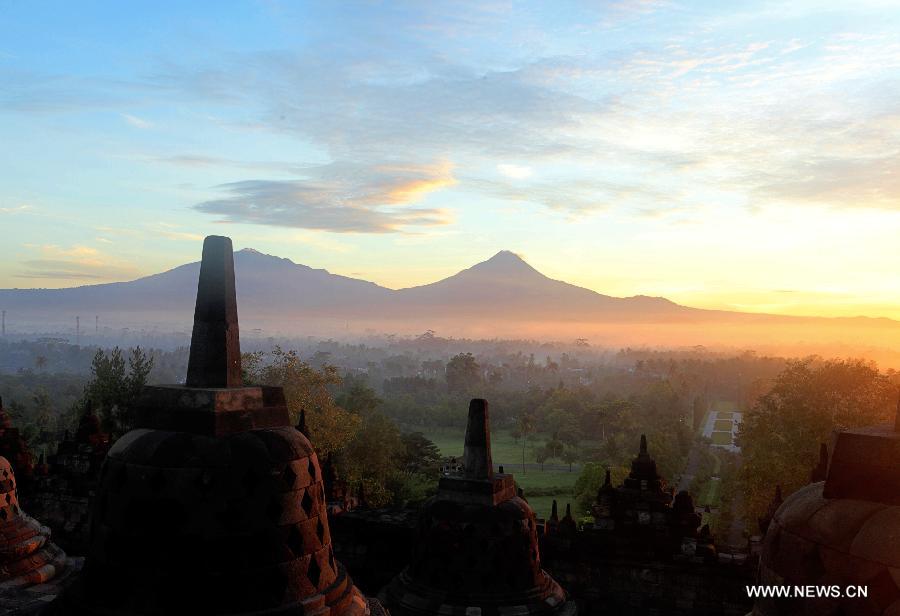 The photo taken on Dec. 20, 2012 shows the Borobudur stupas in Central Java, Indonesia. Borobudur is a 9th-century Mahayana Buddhist Temple. It was listed as a UNESCO World Heritage Site in 1991 and confirmed as the largest temple in the world by the Guiness World Records in 2012. (Xinhua/Jiang Fan) 