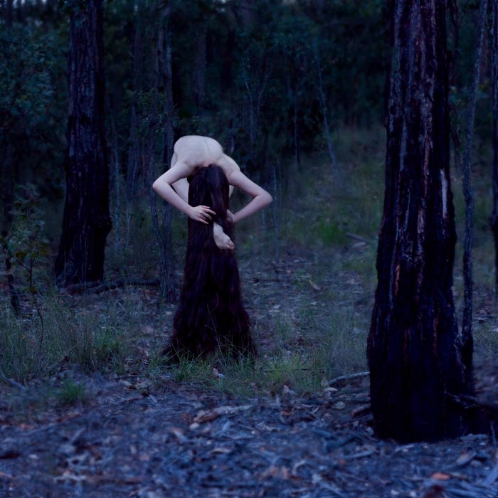 Photographer and former dancer Ingrid Endel completely transforms herself in a series of bewitching self-portraits. (Source: huanqiu.com)