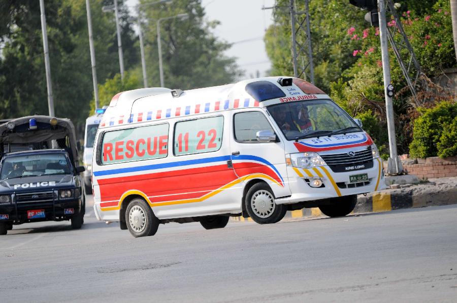 An ambulance transporting bodies of foreign tourists leaves Chaklala Airbase in Rawalpindi, Pakistan, on June 23, 2013. Two Chinese nationals and one Chinese American were among the 11 people killed in a pre-dawn terrorist attack in Pakistan's northern area of Gilgit-Baltistan on Sunday, the Chinese Embassy in Pakistan told Xinhua. (Xinhua/Ahmad Kamal)
