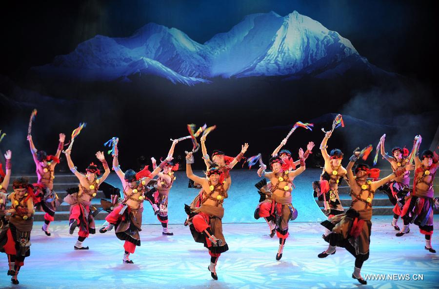 Artists perform during the closing ceremony of the 4th International Festival of Intangible Cultural Heritage in Chengdu, capital of southwest China's Sichuan Province, June 23, 2013. The nine-day festival kicked off here on June 15. (Xinhua/Xue Yubin) 