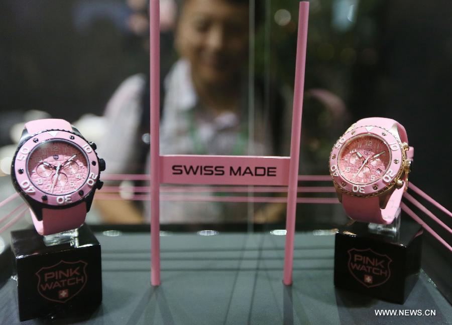 Photo taken on June 22 shows Swiss made watches at the Luxury China 2013 exhibition in Beijing, capital of China. The 3-day exhibition kicked off on Saturday, with over 300 exhibitors participated. (Xinhua)