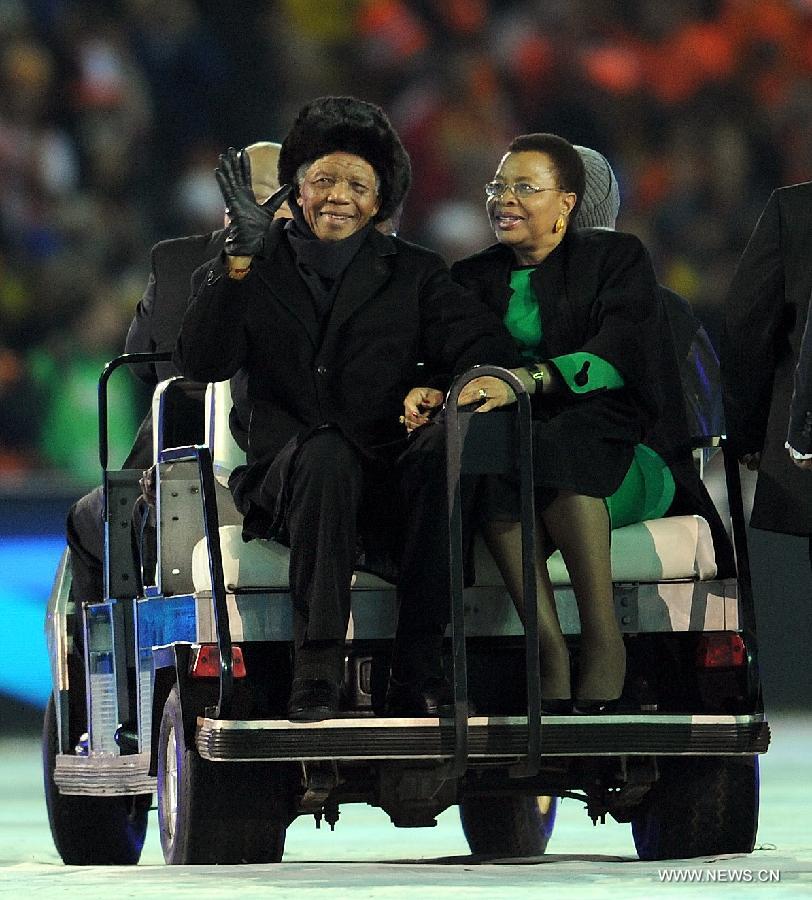 File photo taken on July 11, 2010 shows the former president of South Africa Nelson Mandela (L) attending the closing ceremony of the 2010 FIFA World Cup South Africa in Johannesburg, South Africa. Former South African President Nelson Mandela is in "serious but stable" condition after being taken to a hospital to be treated for a lung infection, the government said Saturday, prompting an outpouring of concern from admirers of a man who helped to end white racist rule. (Xinhua/Wang Yuguo)