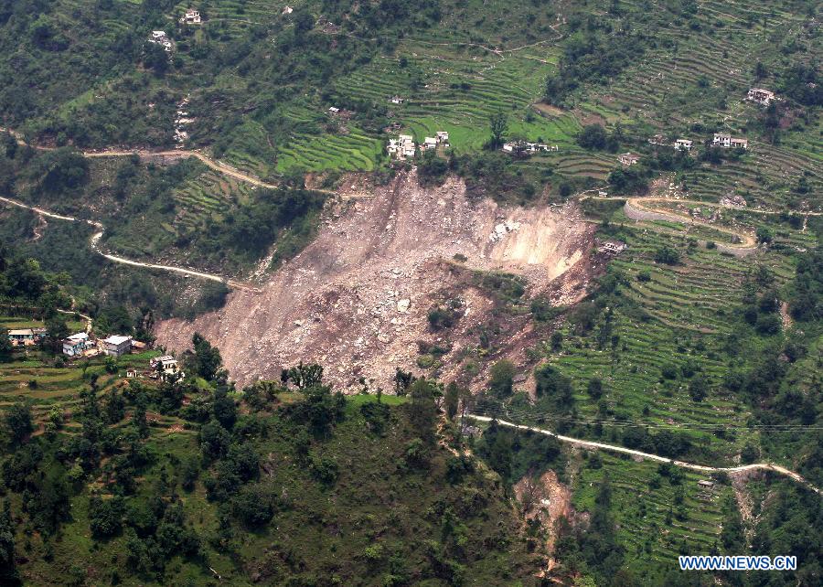 Aerial photo taken on June 23, 2013 shows the Rudraprayag and Srinagar town ravaged by recent torrential rain and flash flood in northern Indian state of Uttarakhand. More than 7,000 people are still stranded in the mountains of Uttarakhand, nearly nine days after monsoon floods swept through the northern Indian state. (Xinhua)