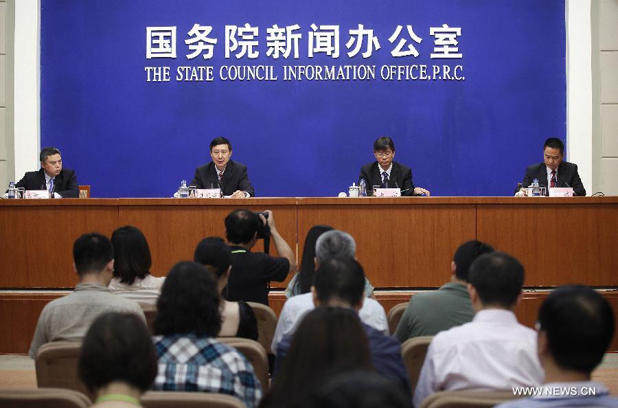 A press conference is held by the State Council (Cabinet) Information Office in Beijing, capital of China, June 26, 2013. The re-entry capsule of China's Shenzhou-10 spacecraft landed successfully on Wednesday in north China's Inner Mongolia Autonomous Region, with three astronauts aboard safe and sound. The press conference was held to introduce the 15-day Shenzhou-10 mission. (Xinhua/Wang Shen)