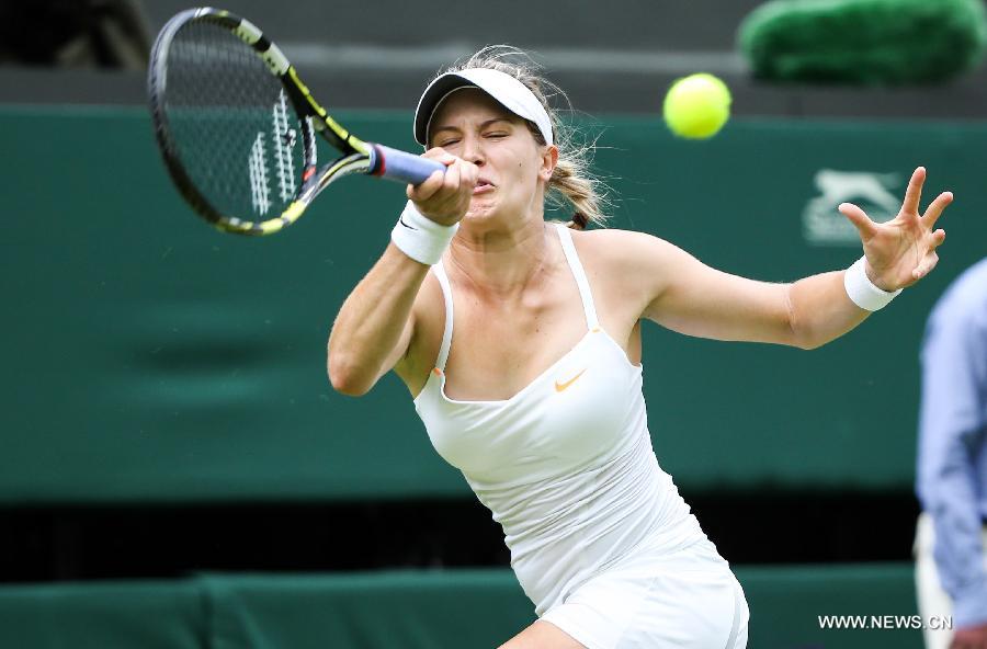 Eugenie Bouchard of Canada competes during the second round of ladies' singles against Ana Ivanovic of Serbia on day 3 of the Wimbledon Lawn Tennis Championships at the All England Lawn Tennis and Croquet Club in London, Britain on June 26, 2013. Bouchard won 2-0.(Xinhua/Tang Shi)