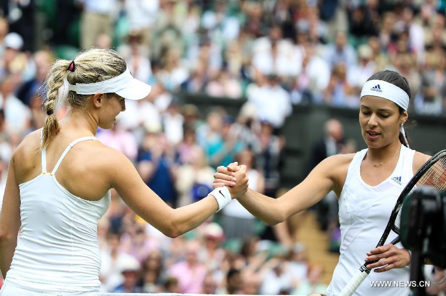 Eugenie Bouchard of Canada and Ana Ivanovic (R) of Serbia greet each other after their second round of ladies' singles match on day 3 of the Wimbledon Lawn Tennis Championships at the All England Lawn Tennis and Croquet Club in London, Britain on June 26, 2013. Ivanovic lost 0-2.(Xinhua/Tang Shi)