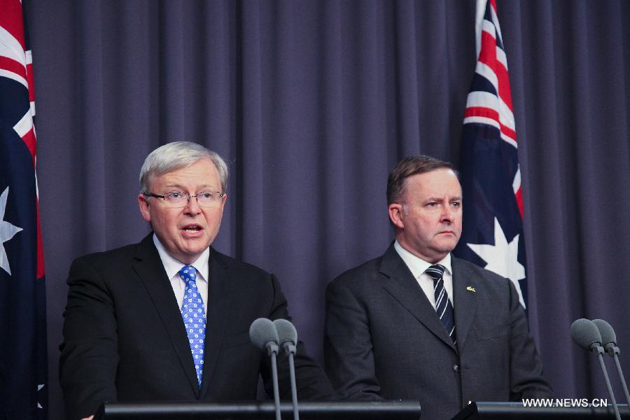 Newly elected Australian ruling Labor Party leader Kevin Rudd (L) and deputy leader Anthony Albanese address the media after winning in Labor party caucus ballot at Parliament House in Canberra, Australia, June 26, 2013. Kevin Rudd was sworn in as prime minister of Australia on June 27 following his victory in a ruling Labor party caucus ballot the evening before. (Xinhua/Justin Qian) 