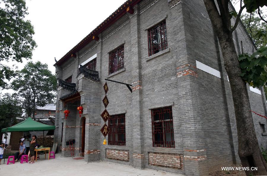Photo taken on June 20, 2013 shows a local hotel in the Haotang Village of Xinyang City, central China's Henan Province. (Xinhua/Li Mingfang) 