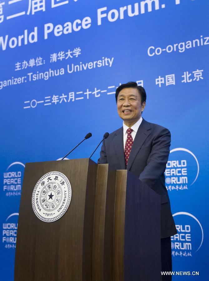 Chinese Vice President Li Yuanchao addresses the opening ceremony of the 2nd World Peace Forum at Tsinghua University in Beijing, capital of China, June 27, 2013. (Xinhua/Xie Huanchi)