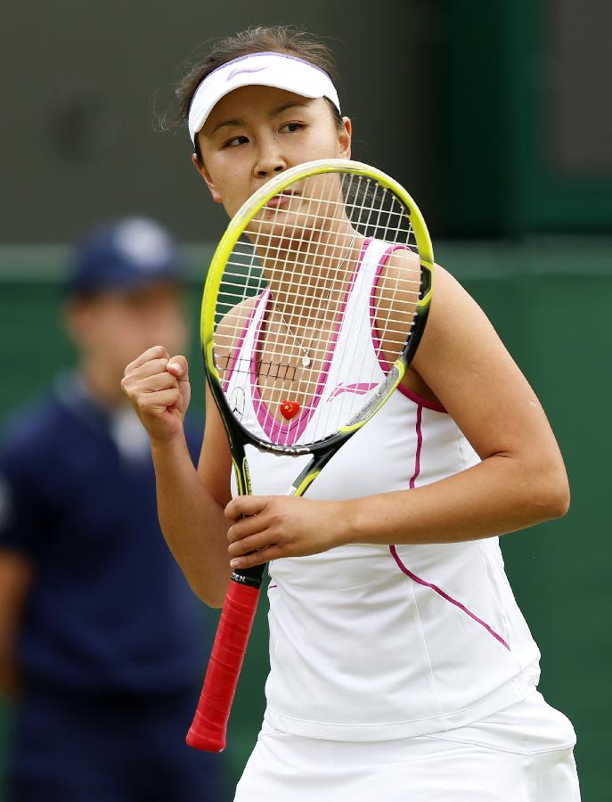 Peng Shuai of China celebrates during the second round of ladies' singles against Marina Erakovic of New Zealand on day 4 of the Wimbledon Lawn Tennis Championships at the All England Lawn Tennis and Croquet Club in London, Britain on June 27, 2013. (Xinhua/Wang Lili)