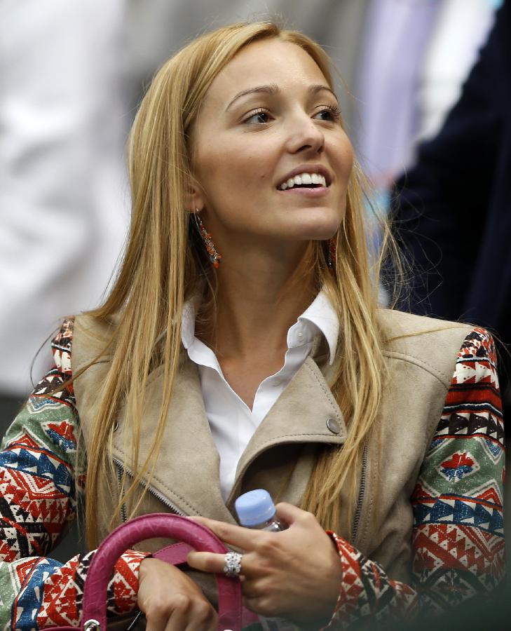 Jelena Ristic, girlfriend of Novak Djokovic of Serbia, reacts after the second round match of men's singles between Novak Kjokovic and Bobby Reynolds of the United States on day 4 of the Wimbledon Lawn Tennis Championships at the All England Lawn Tennis and Croquet Club in London, Britain, on June 27, 2013. Novak Djokovic won 3-0. (Xinhua/Wang Lili)