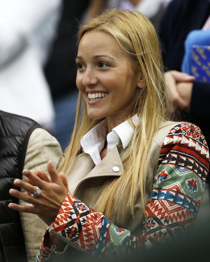 Jelena Ristic, girlfriend of Novak Djokovic of Serbia, reacts after the second round match of men's singles between Novak Kjokovic and Bobby Reynolds of the United States on day 4 of the Wimbledon Lawn Tennis Championships at the All England Lawn Tennis and Croquet Club in London, Britain, on June 27, 2013. Novak Djokovic won 3-0. (Xinhua/Wang Lili)