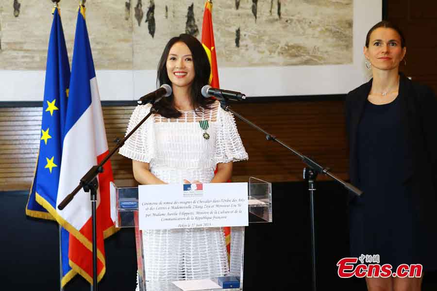 Zhang Ziyi delivers a speech after she was awarded the Order of Arts and Letters by the French government in Beijing, capital of China, June 27, 2013. Established in 1957, the order is the recognition of significant contributions to the arts and literature. (CNS/Li Xueshi)