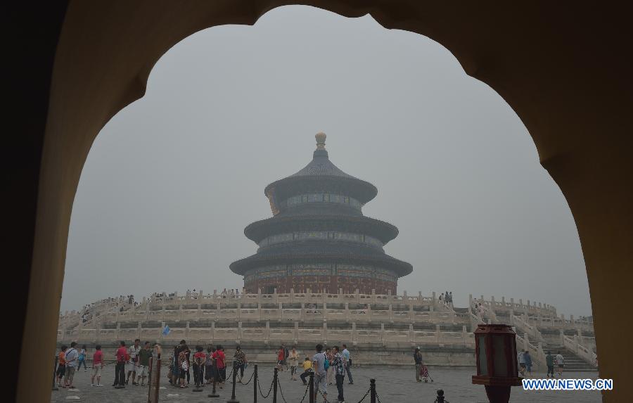 Photo taken on June 28, 2013 shows the Hall of Prayer for Good Harvests bemisted in haze at the Temple of Heaven in Beijing, capital of China. Most parts of Beijing are shrouded by severe haze on Friday. (Xinhua/Wang Qingqin)