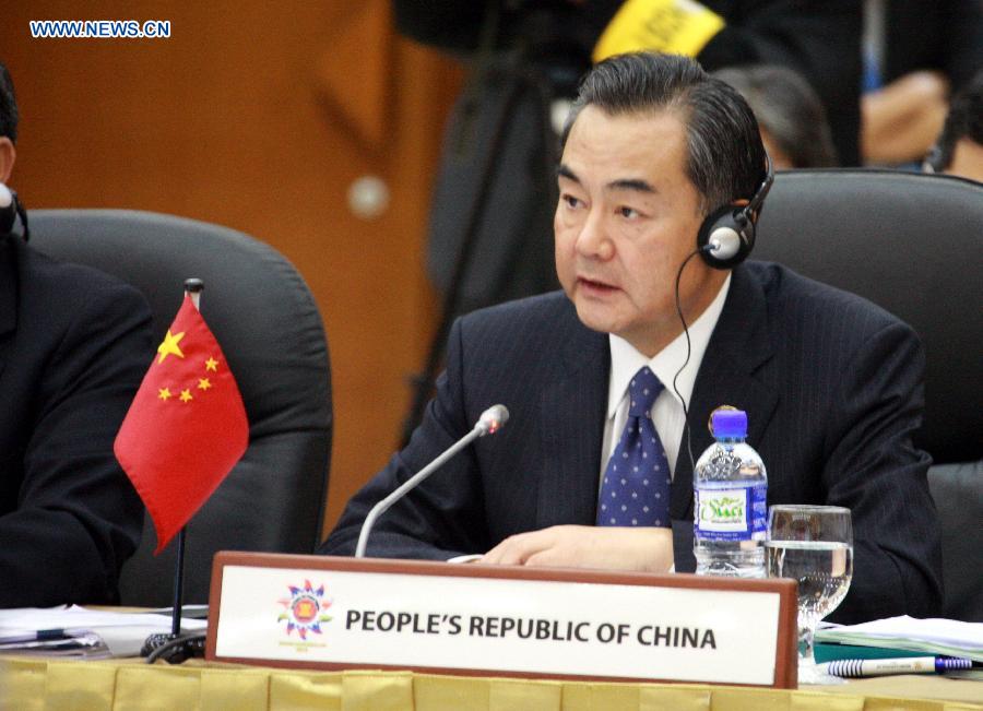 Chinese Foreign Minister Wang Yi speaks during an ASEAN+3 ministerial meeting in Bandar Seri Begawan, Brunei, on June 30, 2013. Chinese Foreign Minister Wang Yi on Sunday asked for efforts to make cooperation between the Association of Southeast Asian Nations (ASEAN) and China, Japan, South Korea the main cooperation channel in East Asia. (Xinhua/Jin Yi)