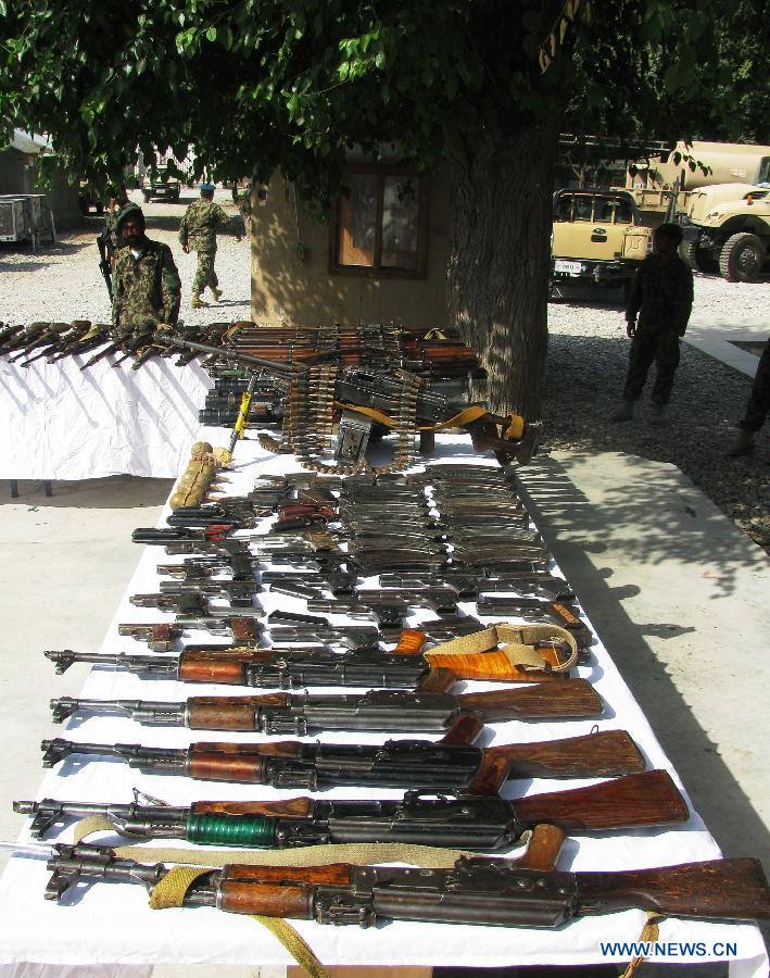 Weapons of Taliban militants are displayed by army soldiers at an army camp in Nangarhar province, eastern Afghanistan, on June 30, 2013. Afghan army soldiers captured weapons of Taliban militants during an operation in Nangarhar province on Sunday, officials said. (Xinhua/Tahir Safi) 