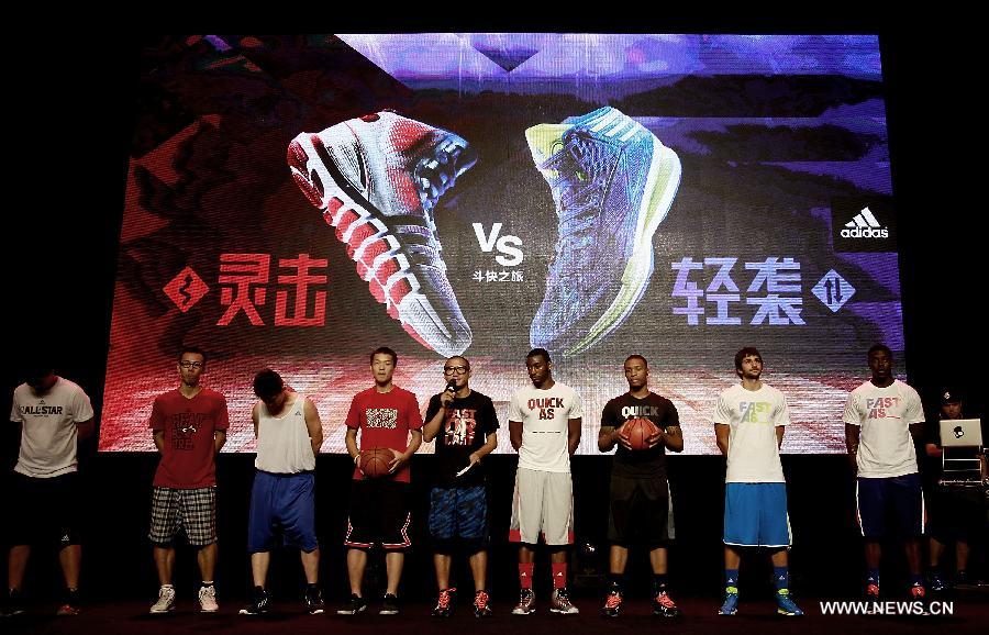 (From 2nd R to 5th R) NBA stars Jrue Holiday from Philadelphia 76ers, Ricky Rubio from Minnesota Timberwolves, Damian Lillard from Portland Trail Blazers and John Wall from Washington Wizards line up with deputies of Chinese basketball fans during a business event in Beijing, capital of China, June 30, 2013. The four NBA stars shared their basketball skills and funs with Chinese fans during a business event in Beijing on Sunday. (Xinhua/Li Ming)