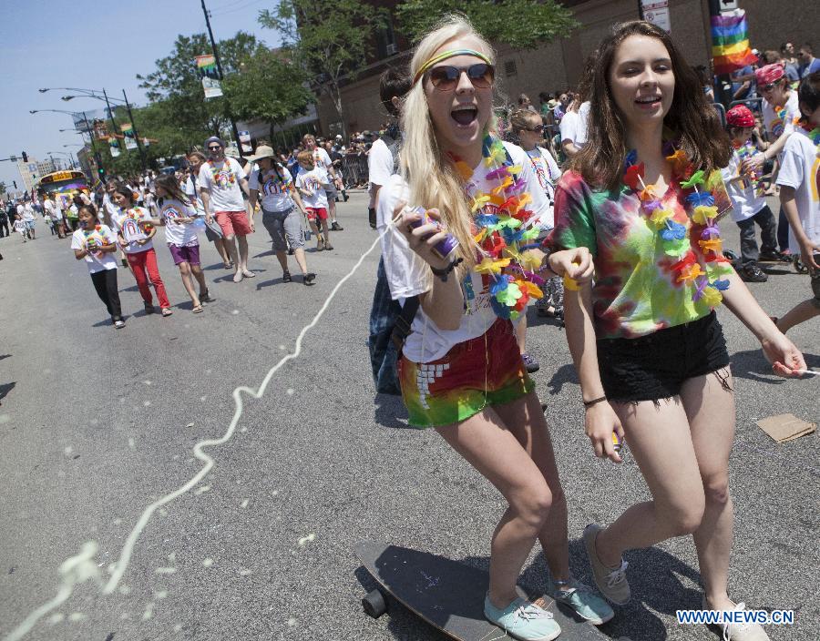 People participate in the annual Gay Pride Parade in Chicago, the United States, June 30, 2013. (Xinhua/Jiang Xintong) 