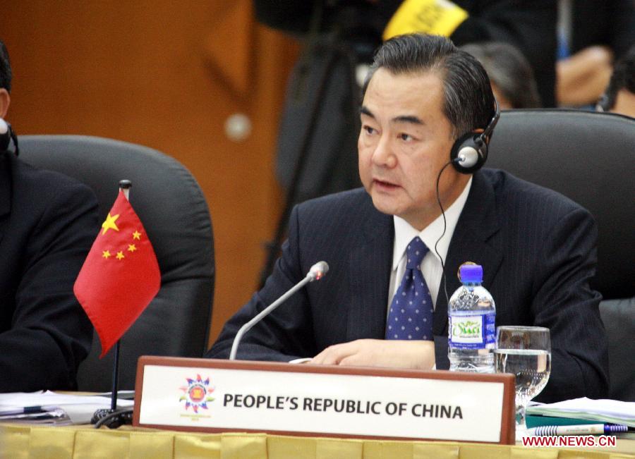 Chinese Foreign Minister Wang Yi speaks during an ASEAN+3 ministerial meeting in Bandar Seri Begawan, Brunei, on June 30, 2013. Chinese Foreign Minister Wang Yi on Sunday asked for efforts to make cooperation between the Association of Southeast Asian Nations (ASEAN) and China, Japan, South Korea the main cooperation channel in East Asia. (Xinhua/Jin Yi)
