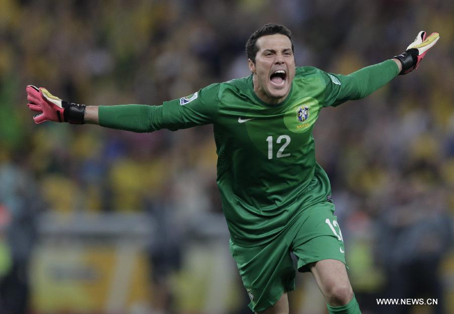 Brazil's goalkeeper Julio Cesar celebrates after scoring during the final of the FIFA's Confederations Cup Brazil 2013 match against Spain, held at Maracana Stadium, in Rio de Janeiro, Brazil, on June 30, 2013. (Xinhua/Guillermo Arias)