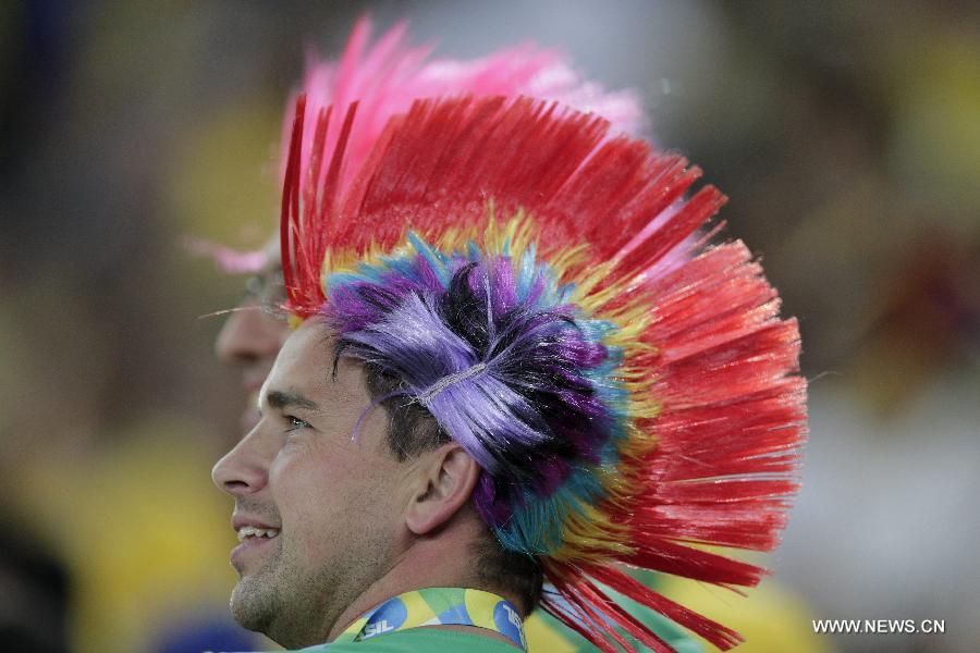 A fan reacts during the closure ceremony of the FIFA's Confederations Cup Brazil 2013 in Rio de Janeiro, Brazil, on June 30, 2013. (Xinhua/Guillermo Arias)