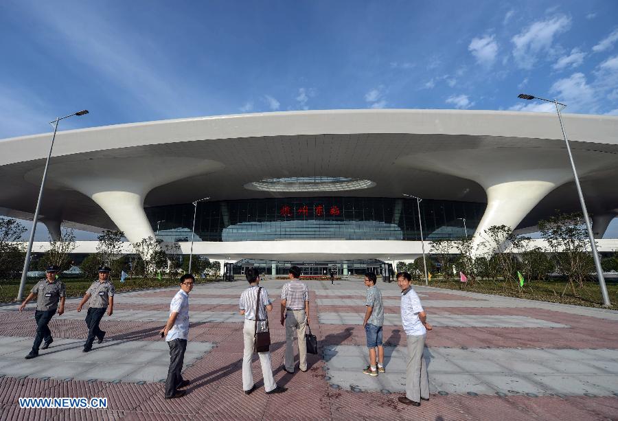 Photo taken on July 1, 2013 shows the exterior view of the newly-opened Hangzhou East Station in Hangzhou, capital of east China's Zhejiang Province. With the building area of 1.13 million square meters, the Hangzhou East Station, China's largest railway terminal, officially opened on Monday. (Xinhua/Zhu Yinwei)