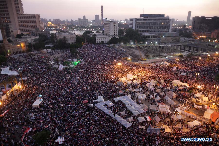 Egyptian anti-President Mohammed Morsi protesters gather during a rally at Tahrir Square in Cairo, July 1, 2013. The Egyptian military issued a statement hours ago, giving "all parties" a 48-hour deadline to respond to the demands of the people, has been seen by security and political experts as necessary to resolve the current political crisis in the turmoil-stricken country. (Xinhua/Wissam Nasser)