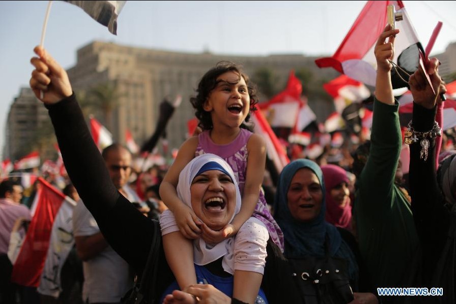 Egyptian anti-President Mohammed Morsi protesters chant slgons during a rally at Tahrir Square in Cairo, July 1, 2013. The Egyptian military issued a statement hours ago, giving "all parties" a 48-hour deadline to respond to the demands of the people, has been seen by security and political experts as necessary to resolve the current political crisis in the turmoil-stricken country. (Xinhua/Wissam Nasser)