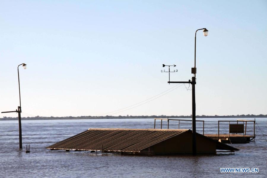 A building is submerged at Paso de la Patria of Corrientes province, Argentina, on July 1, 2013. The village, a tourist resort, has been affected by the Parana River's second highest water level in 15 years, according to local press. (Xinhua/German Pomar/TELAM) 