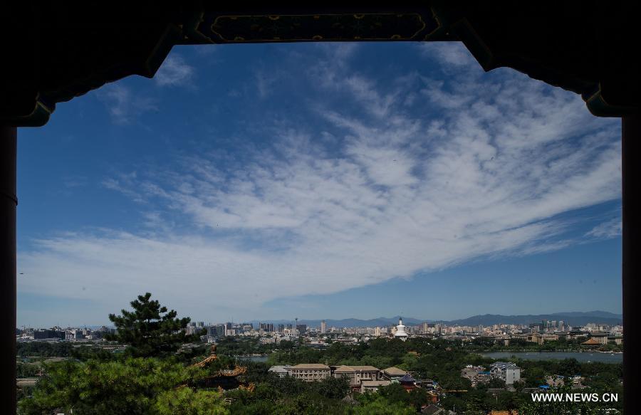 Photo taken on July 2, 2013 shows the scenery viewed at Jingshan Park in Beijing, capital of China. A rainstorm on Monday night brought Beijing with fine weather. (Xinhua/Luo Xiaoguang)