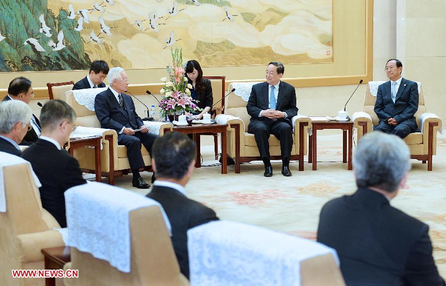 Yu Zhengsheng (2nd R), chairman of the National Committee of the Chinese People's Political Consultative Conference (CPPCC), meets with Etsuhiko Shoyama (3rd R), chairman of the Asia Exchange Association of Japan, in Beijing, capital of China, July 2, 2013. (Xinhua/Li Tao)