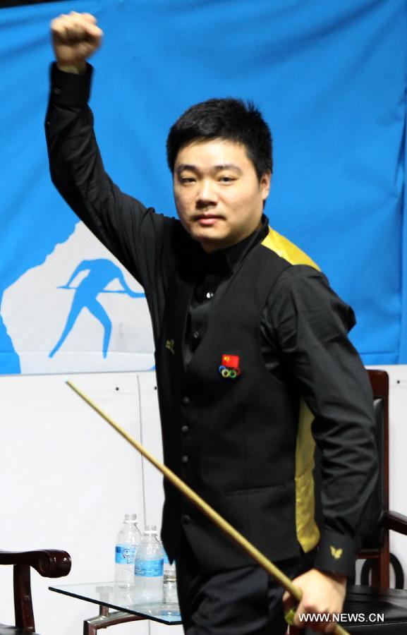 China's Ding Junhui celebrates victory during the men's snooker team final match of the 4th Asian Indoor&Martial Arts Games Incheon at Songdo Convensia in Incheon, South Korea, on July 2, 2013. Team China claimed the title. (Xinhua/Park Jin-hee)