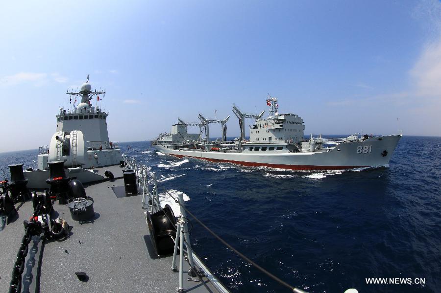 The destroyer Shenyang and comprehensive supply ship Hongze Lake are seen during Sino-Russian joint naval drills held in the sea of Japan, July 4, 2013. (Xinhua/Zha Chunming) 