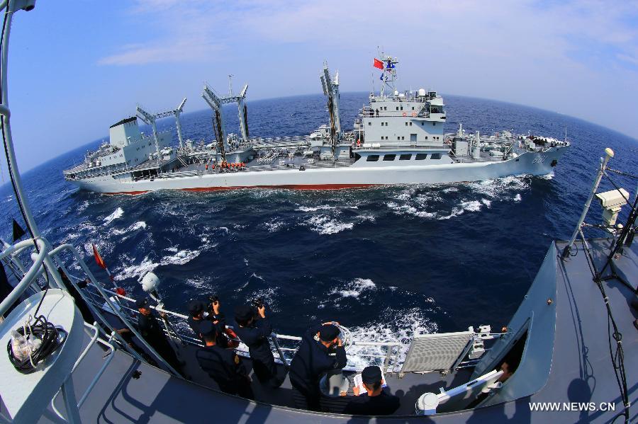 The destroyer Shenyang and comprehensive supply ship Hongze Lake are seen during Sino-Russian joint naval drills held in the sea of Japan, July 4, 2013. (Xinhua/Zha Chunming) 