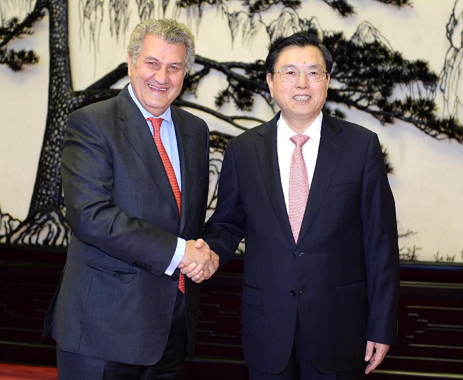 Zhang Dejiang (R), chairman of the Standing Committee of China's National People's Congress (NPC), meets with Jesus Posada, president of the Congress of Deputies of Spain, in Beijing, capital of China, July 4, 2013. (Xinhua/Li Tao)