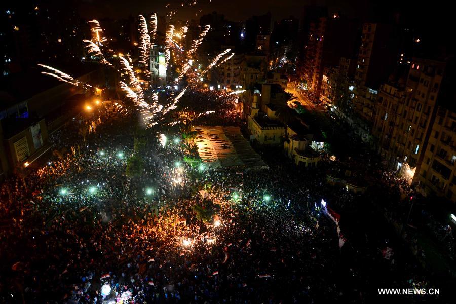 Egyptians in Alexandria celebrate after Morsi ousted by army