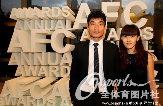 Guangzhou Evergrande: Zheng Zhi and his wife. (Photo/Osports)
