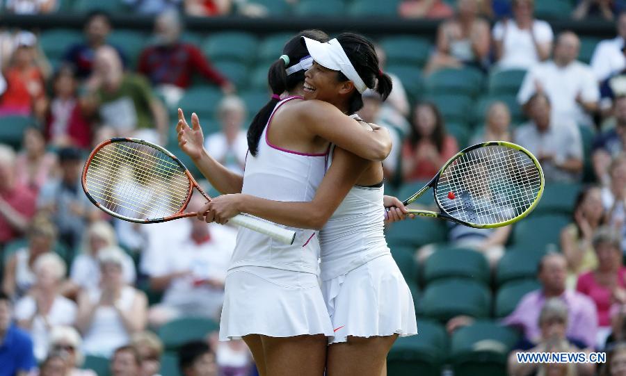 Peng Shuai(L) of China and Su-Wei Hsieh of Chinese Taipei celebrate after the final of women's doubles on day 12 of the Wimbledon Lawn Tennis Championships at the All England Lawn Tennis and Croquet Club in London, Britain on July 6, 2013. Peng Shuai and Su-Wei Hsieh claimed the title by defeating Australia's Ashleigh Barty and Casey Dellacqua with 7-6(1) 6-1.(Xinhua/Wang Lili) 