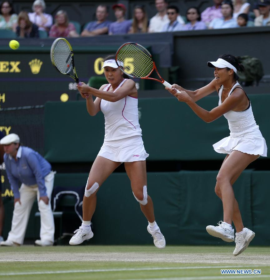Peng Shuai(L) of China and Su-Wei Hsieh of Chinese Taipei compete during the final of women's doubles on day 12 of the Wimbledon Lawn Tennis Championships at the All England Lawn Tennis and Croquet Club in London, Britain on July 6, 2013. Peng Shuai and Su-Wei Hsieh claimed the title by defeating Australia's Ashleigh Barty and Casey Dellacqua with 7-6(1) 6-1.(Xinhua/Wang Lili) 