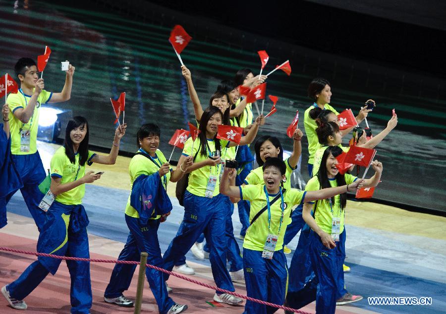 Hong Kong of China delegation enters the stadium during the opening ceremony of the Summer Universiade in Kazan, Russia, July 6, 2013. (Xinhua/Jiang Kehong) 