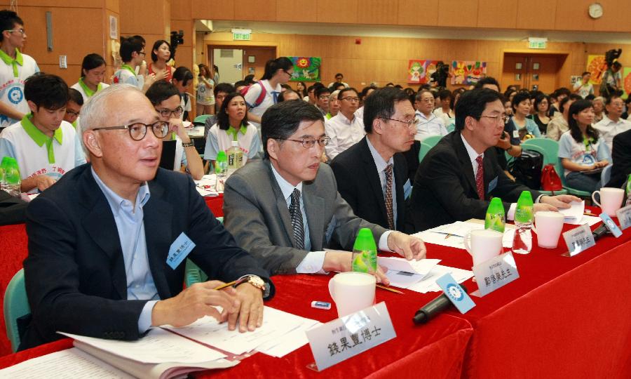 Judges watch the seventh Hong Kong Cup Diplomatic Knowledge Contest in Hong Kong, south China, July 6, 2013. The seventh Hong Kong Cup Diplomatic Knowledge Contest, aimed at raising awareness of the nation's diplomatic situation and policies, closed here on Saturday. (Xinhua/He Jingjia)