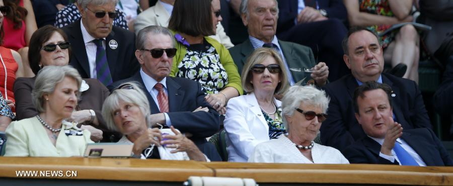 David Cameron(1st R), the Prime Minister of the United Kingdom, Jacques Rogge(2nd L, 2nd Row),President of the International Olympic Committee and Tomislav Nikolic(1st R, 2nd Row), the President of Serbia watch in the royal box during the final of gentlemen's singles between Novak Djokovic of Serbia and Andy Murray of Great Britain on day 13 of the Wimbledon Lawn Tennis Championships at the All England Lawn Tennis and Croquet Club in London, Britain on July 7, 2013. (Xinhua/Wang Lili)