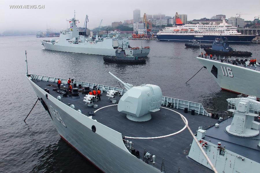 Chinese Navy vessels leave for joint naval drills from a port in Vladivostok, Russia, July 8, 2013. China and Russia started on Monday the joint naval drills off the coast of Russia's Far East. (Xinhua/Zha Chunming)