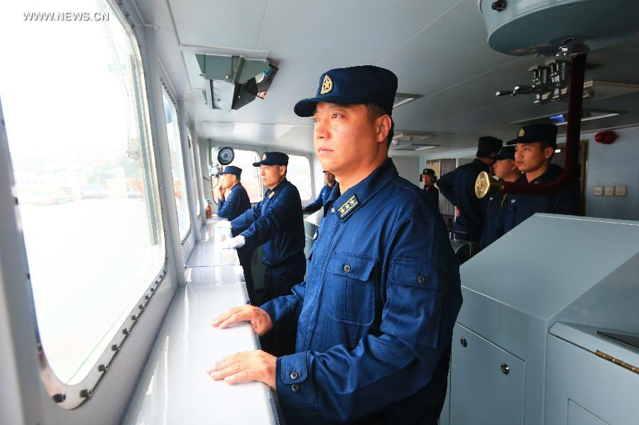 Zhang Changlong, captain of commander ship "Shenyang" of Chinese Navy vessels attending joint naval drills, is seen during the exercises near Vladivostok, Russia, July 8, 2013. China and Russia started on Monday the joint naval drills off the coast of Russia's Far East. (Xinhua/Zha Chunming)