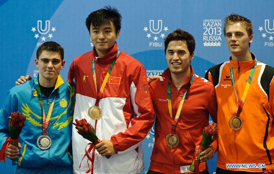 Gold medalist Dong Chao (2nd L) of China poses with silver medalist Ruslan Kurbanov (1st L) of Kazakhstan and bronze medalist Tristan Tulen (1st R) of the Netherlands and Max Heinzer of Switzerland during the awarding ceremony of the Men's Epee Individual Finals at the 27th Summer Universiade in Kazan, Russia, July 8, 2013. Dong claimed the title by defeating Kazakhstan's Ruslan Kurbanov with 15-10. (Xinhua/Jiang Kehong)