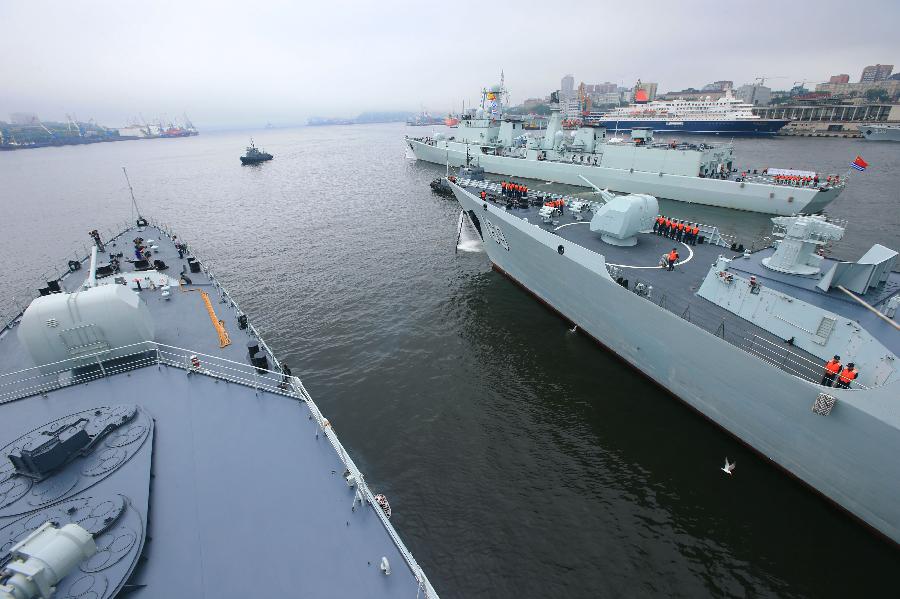 Chinese Navy vessels leave for joint naval drills from a port in Vladivostok, Russia, July 8, 2013. China and Russia started on Monday the joint naval drills off the coast of Russia's Far East. (Xinhua/Zha Chunming) 