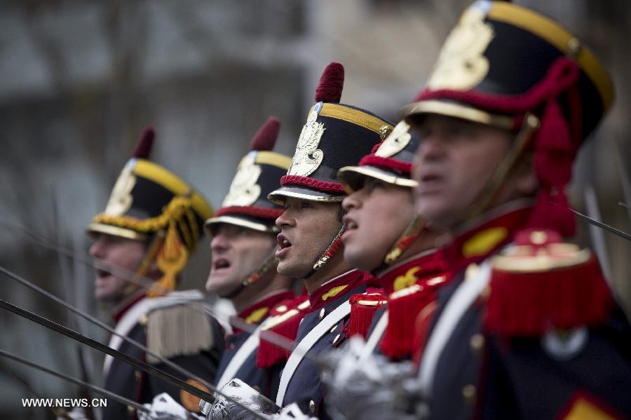 Members of the Regiment of Patricians sing the national anthem during the celebration of Independence Day, in Buenos Aires, Argentina, on July 9, 2013. (Xinhua/Martin Zabala)