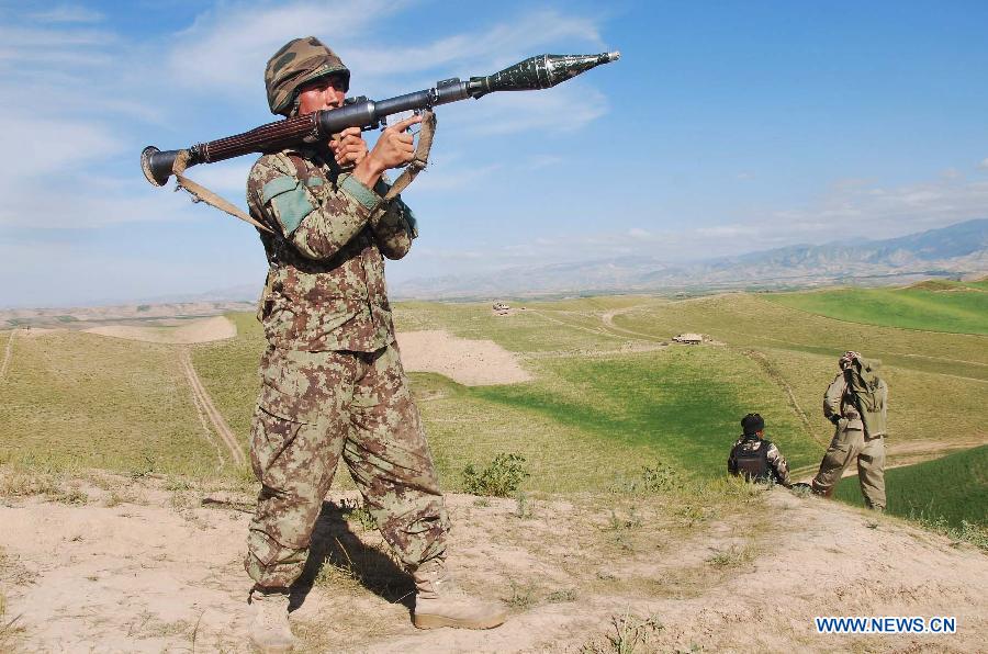 An Afghan Army soldier operates a RPG (Rocket Propelled Grenade) during an operation against Taliban fighters in Badakhshan province in northeast Afghanistan on July 9, 2013. 38 Taliban militants have been killed in security operations across Afghanistan within the last 24 hours, said the country's Interior Ministry Tuesday morning. (Xinhua/Azorda)