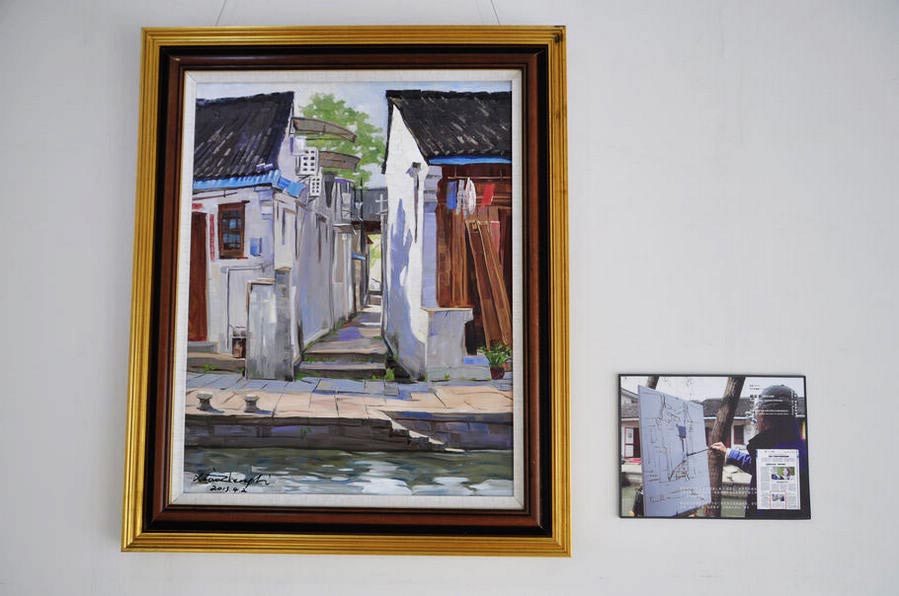 "Yaojia Alley, Shaoxing City" (90cmX70cm), April 2, 2013. Chinese Australian oil painter Li Xiaozheng's new exhibition themed "Jiangnan Charm" opened on July 7 at the Roundness Art Gallery in Beijing's Songzhuang, the largest art zone in both China and the world. The exhibition features 28 artworks created by Li during his 34-day fieldtrip, between March and April of this year, to Jiangnan. (China.org.cn/Zhang Junmian)
